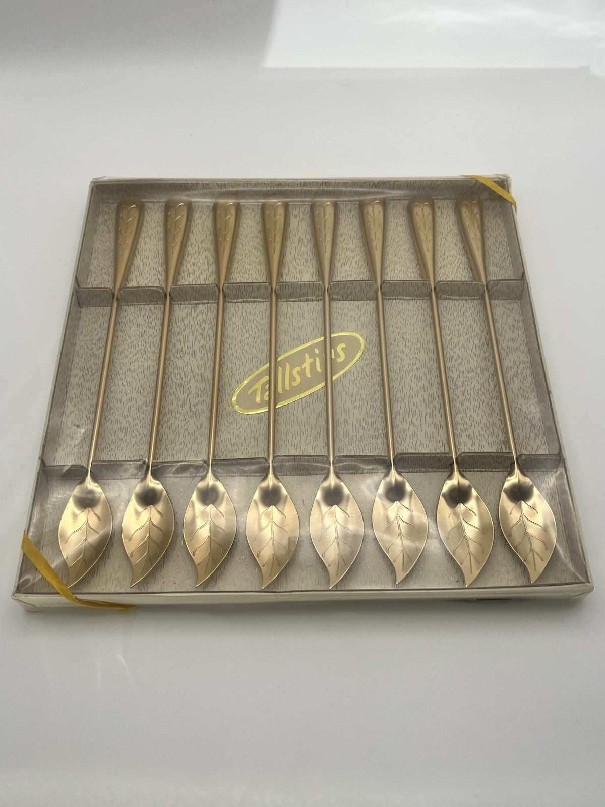 set of vintage gold-tone "Tallstirs" iced tea spoons